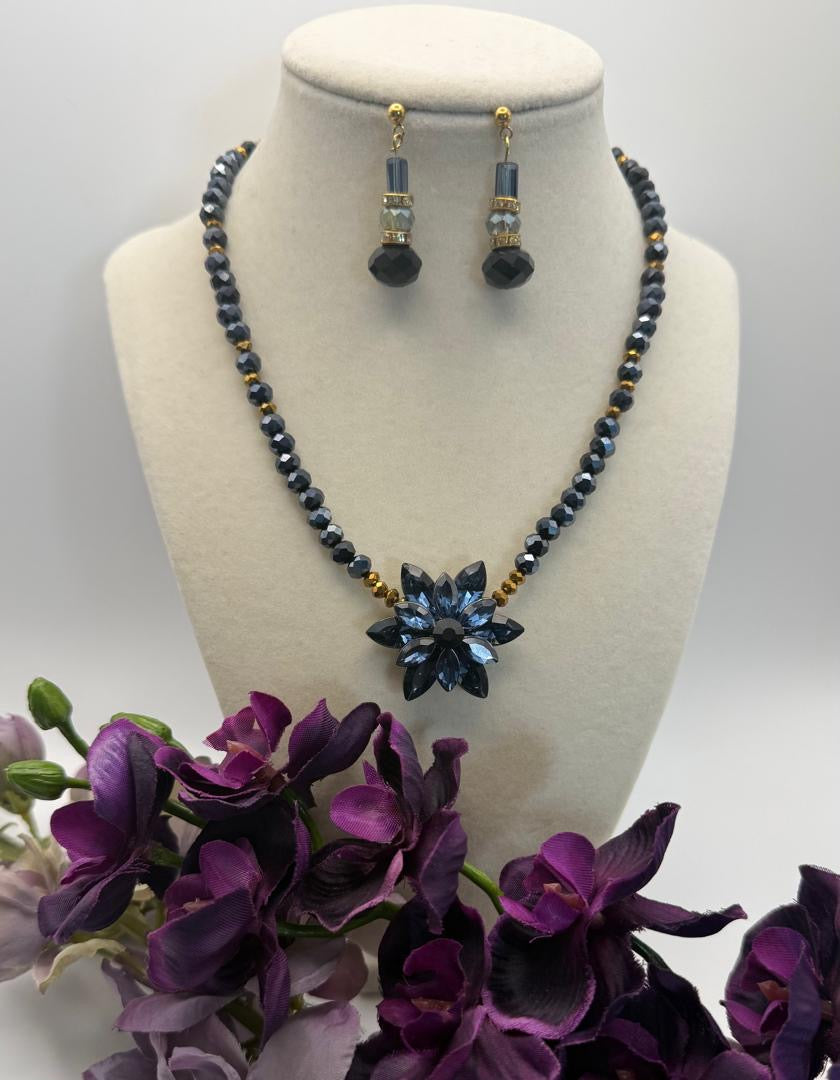 A necklace of Navy blue crystals and a navy blue gemstone pendant