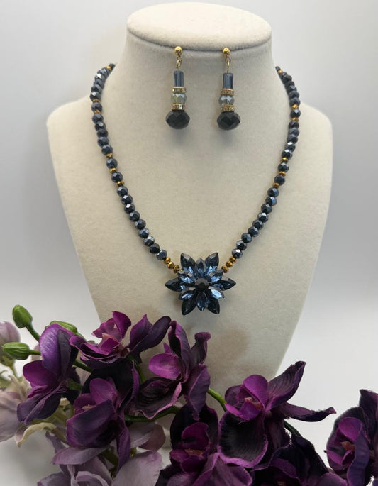 A necklace of Navy blue crystals and a navy blue gemstone pendant