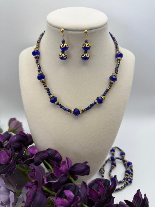 Blue crystal and small gold and blue beads